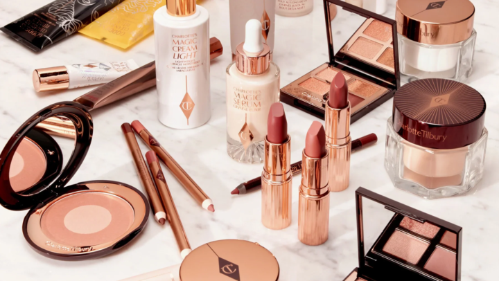 Various Charlotte Tilbury makeup products, including lipsticks, palettes, pencils, and creams.